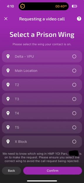 A mobile phone screen from the "Purple Visits" app shows a menu to select a prison wing for a video call.