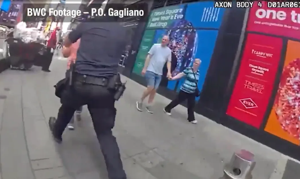 Body camera footage shows an officer, a man, and a woman on a city street.