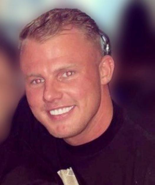 Matthew Newton smiling at the camera.