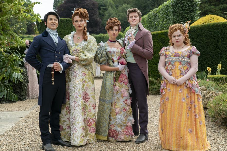 James Phoon as Harry Dankworth, Bessie Carter as Prudence Featherington, Harriet Cains as Philipa Featherington, Lorn Macdonald as Albion Finch, and Nicola Coughlan as Penelope Featherington in Bridgerton.