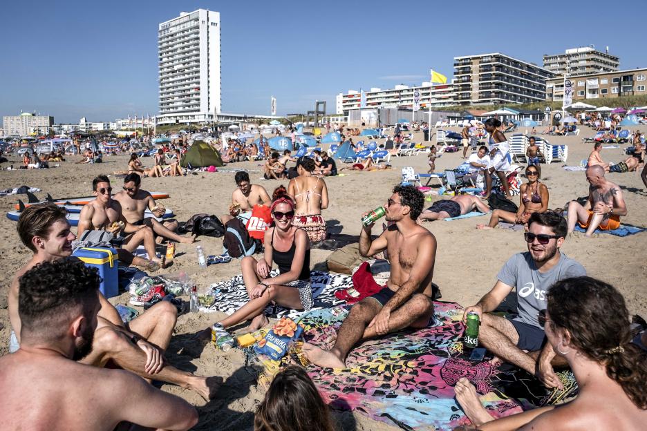 Young people gathered on the beach in Zandvoort, The Netherlands.