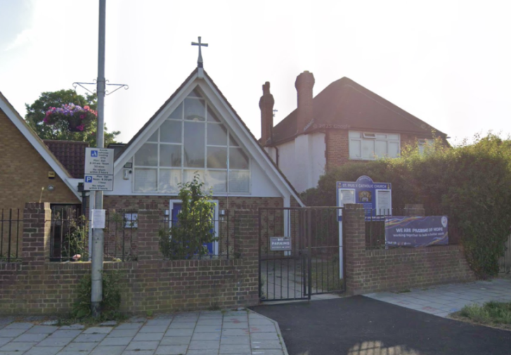 St. Pius X Roman Catholic Church in Norbiton, with a large cross on its roof.