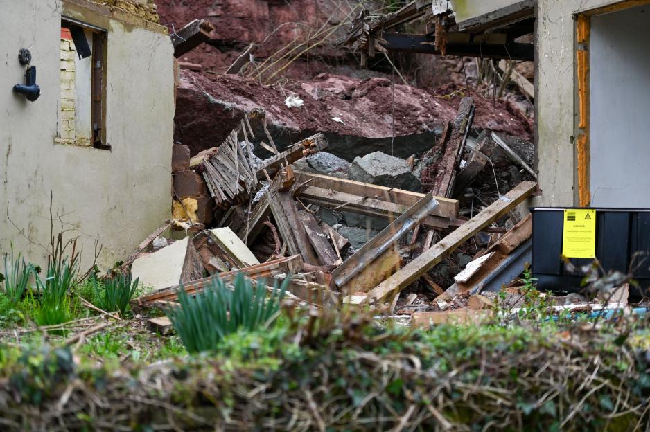 Family have miracle escape after landslide destroys village home