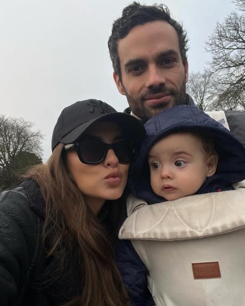 Lucy Watson with her partner and baby.