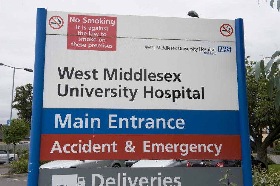 Sign for West Middlesex University Hospital, with directions for the Main Entrance, Accident & Emergency, and Deliveries.