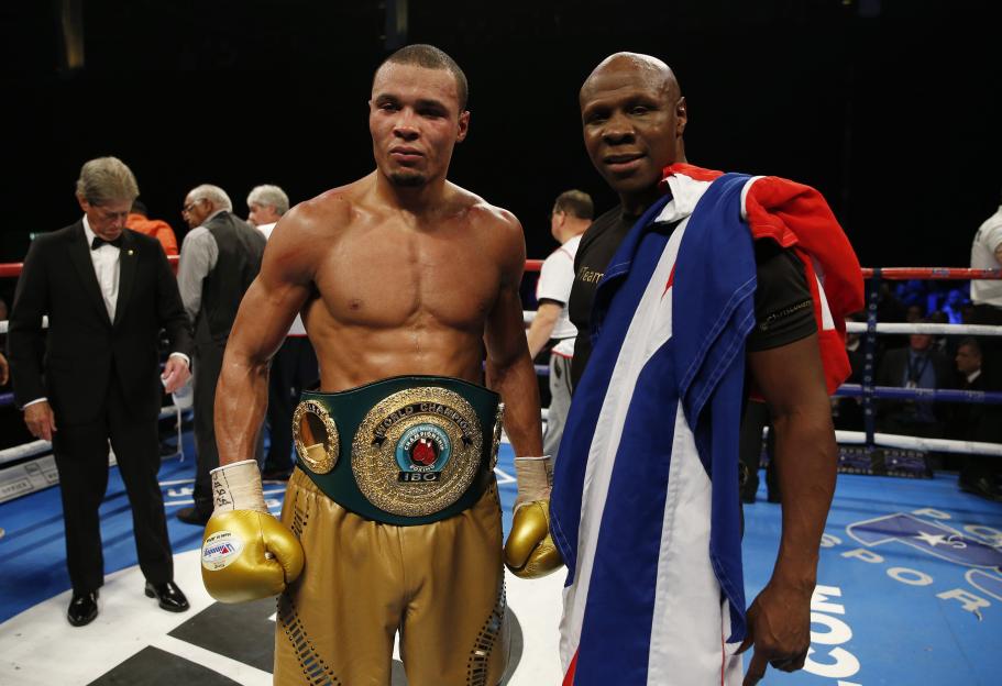 Chris Eubank Jr. and his father Chris Eubank celebrate after Eubank Jr. won the IBO Super-Middleweight title.