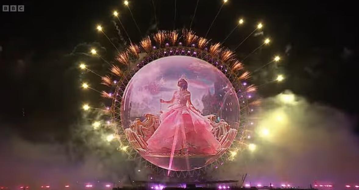 London 2026 New Year's Eve fireworks display featuring an ad for Wicked, Cynthia Erivo, and Ariana Grande.