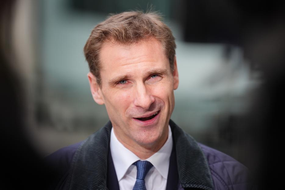 Chris Philp speaking to the media outside BBC Broadcasting House.