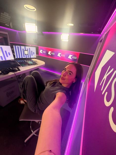 Evanna Maxted, Kiss FM presenter, takes a selfie in a radio studio.