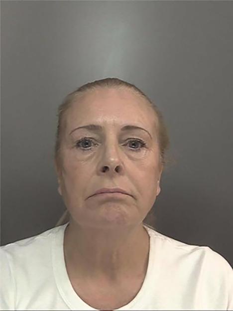 Mugshot of Helen Spree, a blonde woman with her hair pulled back, wearing a white t-shirt.
