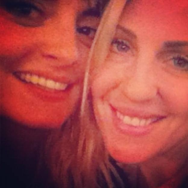 Close-up of Morgana Robinson and Brody Dalle smiling.