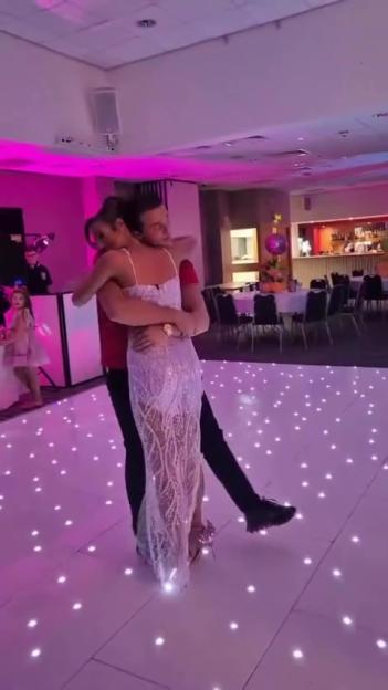 Venezuela Fury and Noah Price dancing at their engagement party.