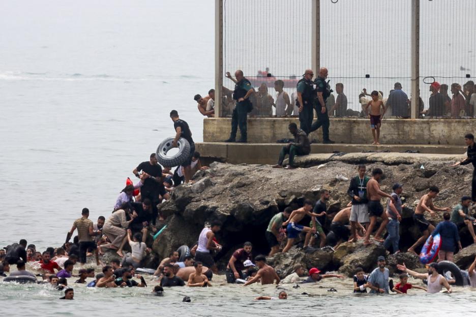 Spain Deploys Army as Thousands of Migrants Surge Across Border, Leaving at Least 18 Dead and Shops Closed