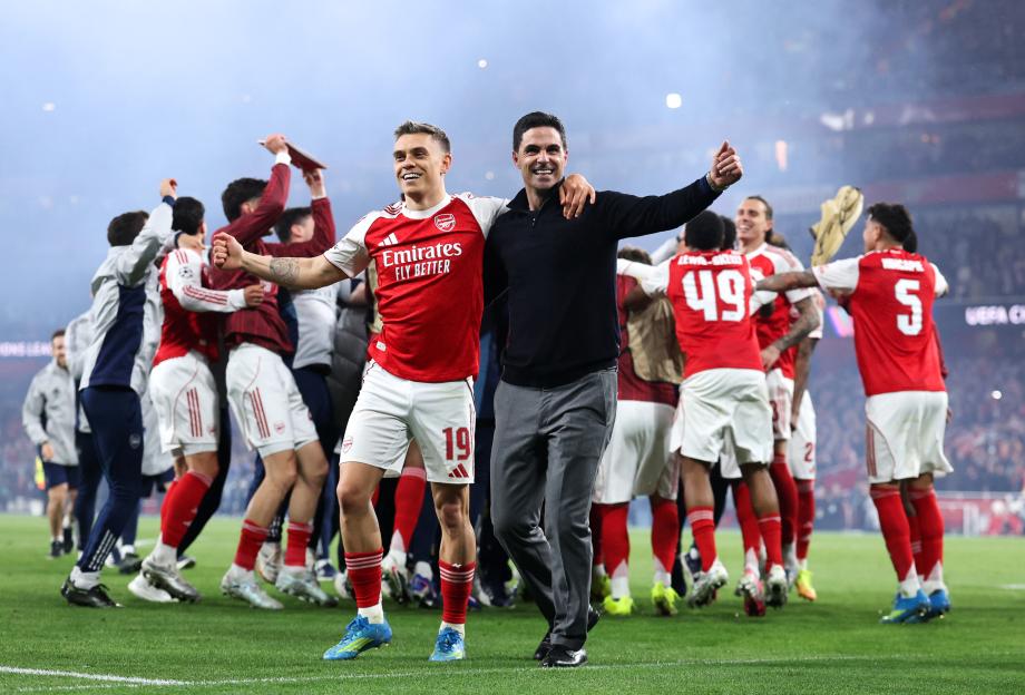 Mikel Arteta celebrates with Leandro Trossard after the UEFA Champions League semi-final match.