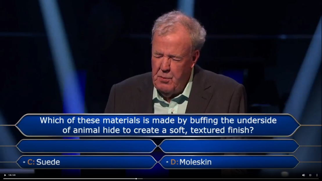 Jeremy Clarkson looking stressed on "Who Wants To Be A Millionaire" with a question and two answer choices visible on the screen.