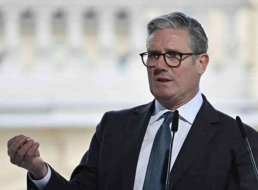 British Prime Minister Keir Starmer speaks at a press conference in Kyiv.