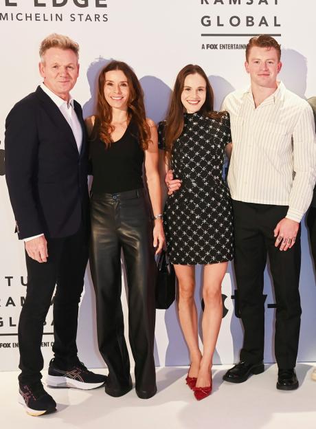 Gordon Ramsay, Tana Ramsay, Holly Ramsay, Adam Peaty, Matilda Ramsay, and two other guests pose at the "Night Of The Stars" event for the Apple TV+ series "Knife Edge: Chasing Michelin Stars."