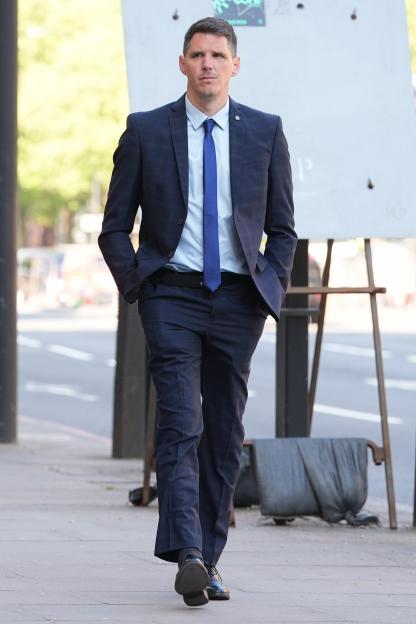 Former Cambridgeshire Police sergeant Paul Street walking into Westminster Magistrates' Court.