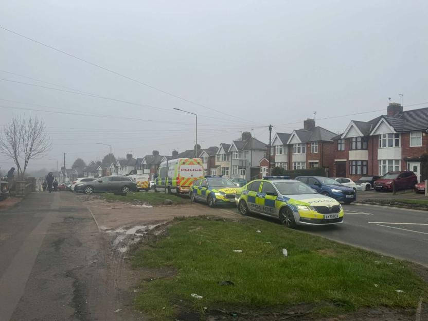 Police vehicles and officers present at Broad Avenue in Evington, Leicester.