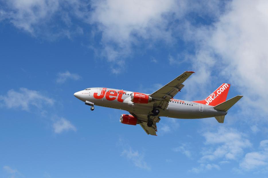 Jet2.com Boeing 737 aircraft on final approach to Manchester Airport, UK.