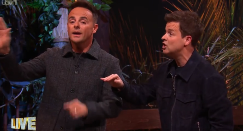 Ant and Dec standing on a stage, gesturing with their hands.