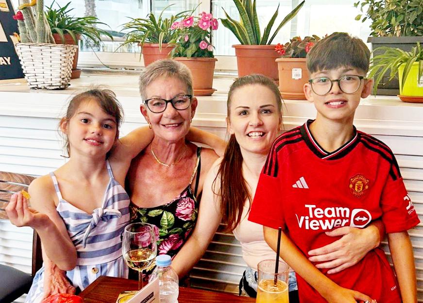 Linda Harris with her daughter Katie and two grandchildren.