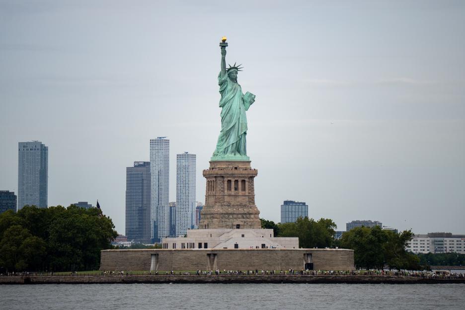 Tragedy Strikes: Baby and Woman Lose Lives as Boat Capsizes; Coastguards Rescue Dozen Near Statue of Liberty