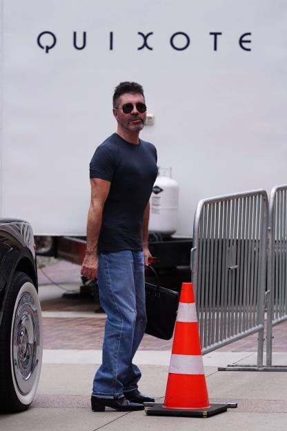 Simon Cowell Gives The Peace Sign Outside America's Got Talent