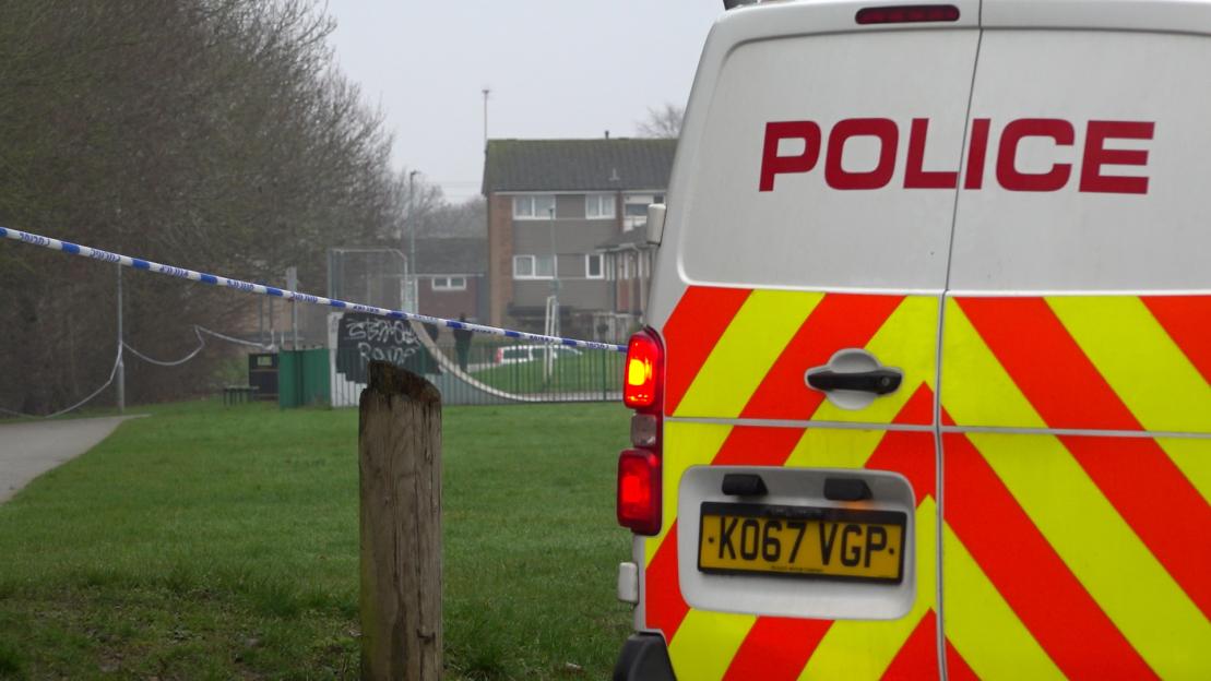 Police van at a skate park where a man was stabbed to death.