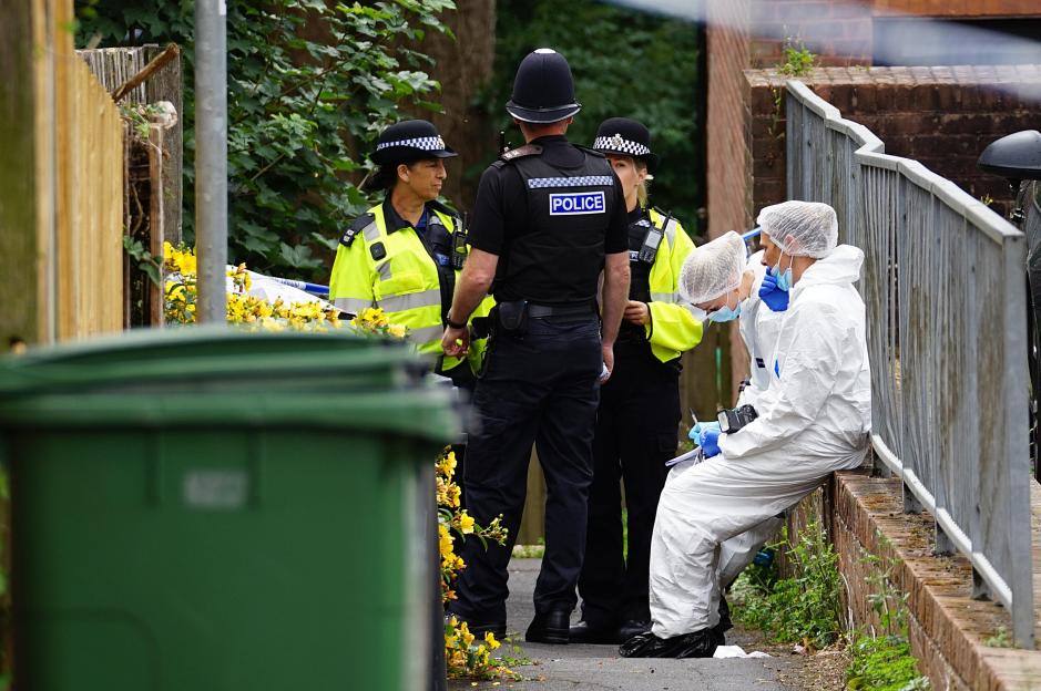 Police and forensic officers investigating an incident.
