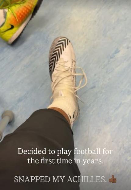 A person's foot in a football boot with text "SNAPPED MY ACHILLES"