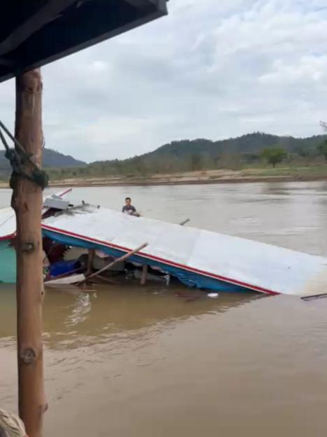 Shocking footage shows tourists cry for help as water submerges sinking Laos ferry