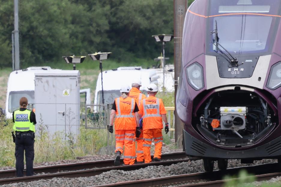 1 dead, several injured in 2-train collision near Bedford