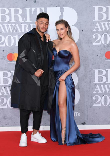Alex Oxlade-Chamberlain and Perrie Edwards on the red carpet.