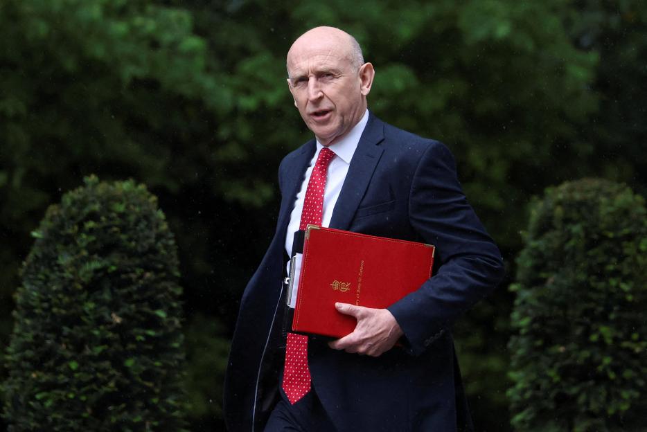 Britain's Defence Secretary John Healey walking outside 10 Downing Street.