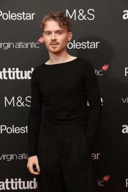 Max Balegde arrives at the Attitude Awards in London, wearing a black long-sleeve top and black trousers.