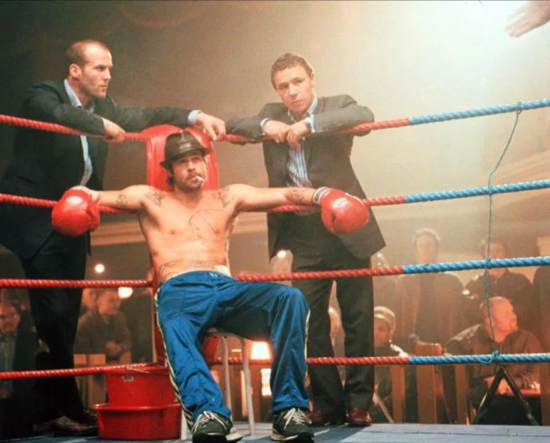 Jason Statham, Brad Pitt, and Stephen Graham in the film Snatch.