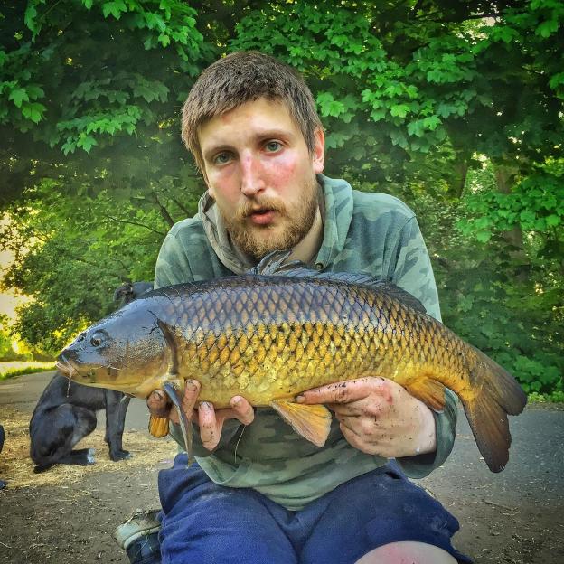 Bradley Spencer Townsend holding a large fish.
