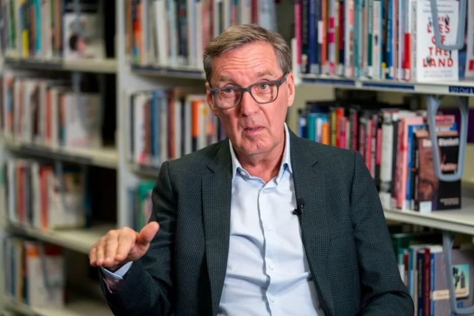 Alan Milburn speaks as part of the Jobs Army work experience campaign in a library.