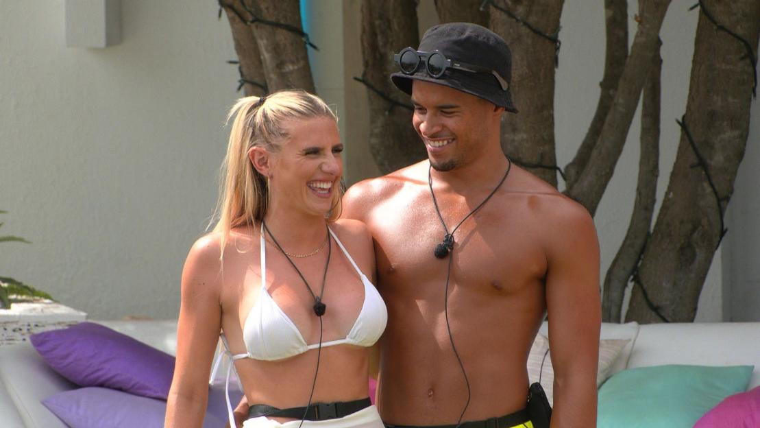 Chloe Burrows and Toby Aromolaran laughing together during the 'A Couple of Sorts' challenge on Love Island.