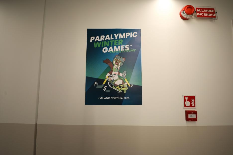 Milan, Lombardy, Italy. 3rd Mar, 2026. A Para Ice Hockey poster is seen in the corridor inside the residential area of the Paralympic Village on day-3 at the Milano Cortina 2026 Paralympic Winter Games (Credit Image: ¿ Mickael Chavet/ZUMA Press Wire)