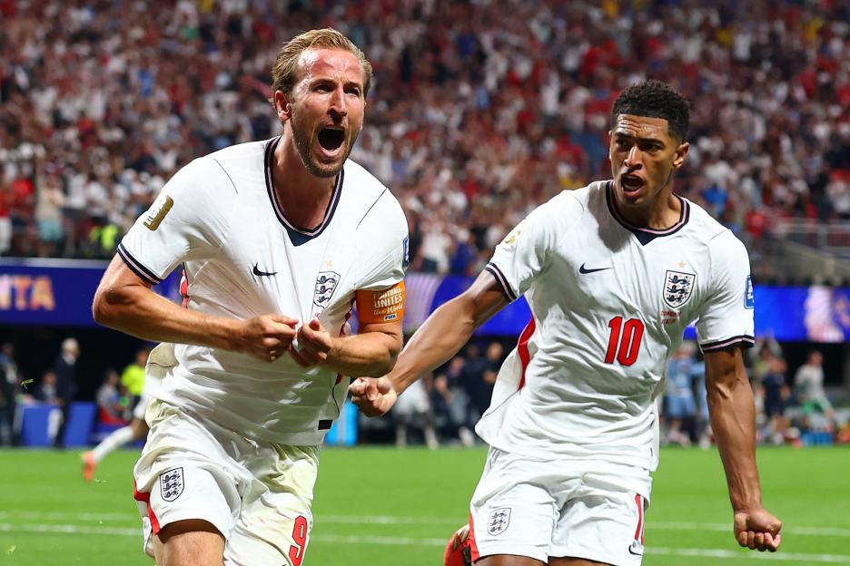 Harry Kane and Jude Bellingham of England celebrating a goal during a World Cup match.