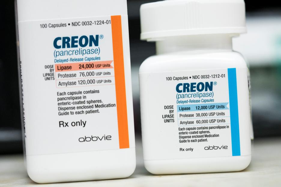 Bottles of Creon (pancrelipase) prescription pharmaceuticals, manufactured by Abbvie, photographed in a pharmacy.