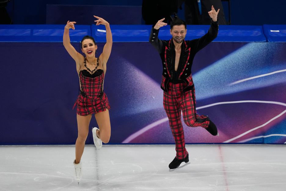 Lilah Fear and Lewis Gibson ice dancing at the 2026 Winter Olympics.