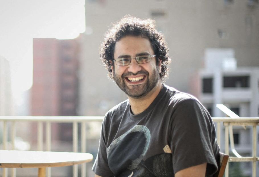 Egyptian-British hunger striker Alaa Abd el-Fattah smiles and poses for a photo.