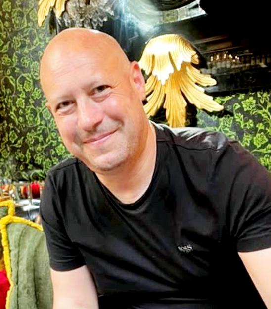 Jack Frogell in a black t-shirt.