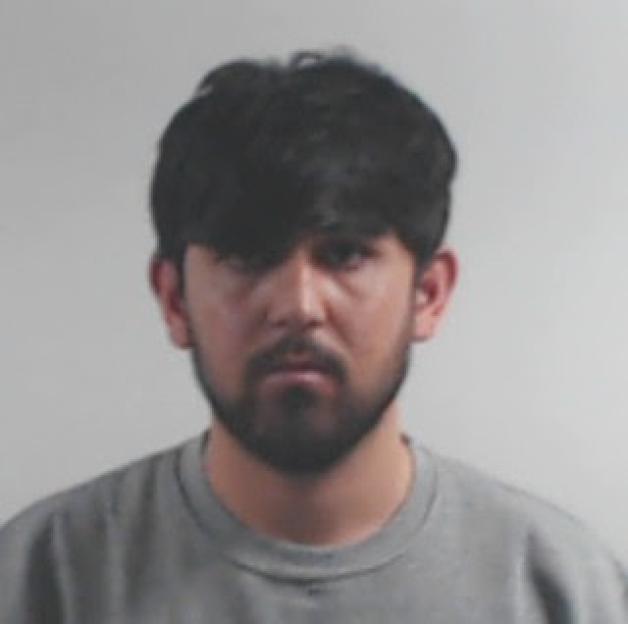 Mugshot of Rapualla Ahmadze, who was jailed for rape.