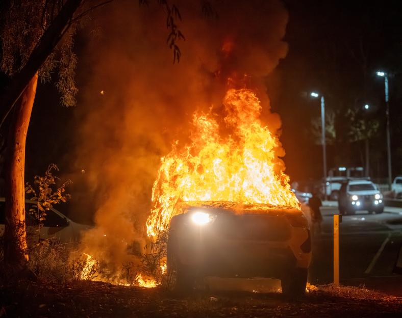 Riot erupts outside Alice Springs hospital after police arrest suspect in girl's death