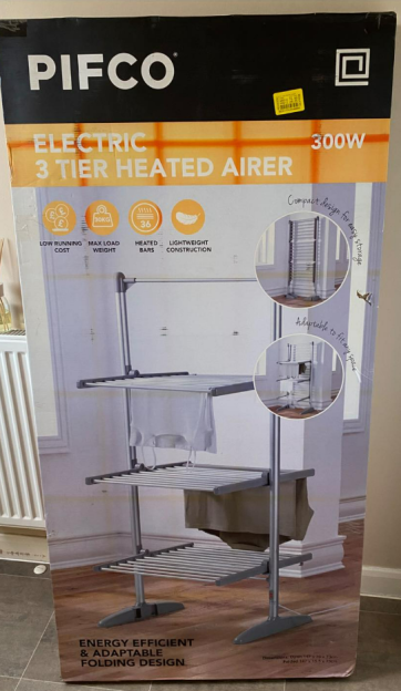 Packaging for a Pifco 3-tier electric heated airer, featuring its design and features like low running cost and 300W power.