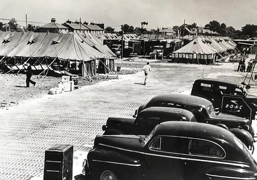 Cars parked and tents used as terminal buildings at Heathrow Airport in 1946.